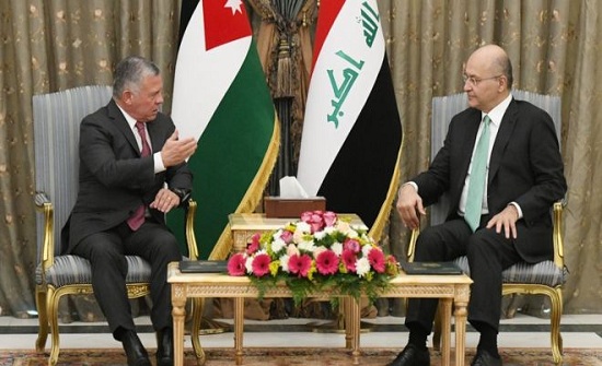 الملك يستقبل الرئيس العراقي لدى وصوله عمان الملك يستقبل الرئيس العراقي لدى وصوله عمان