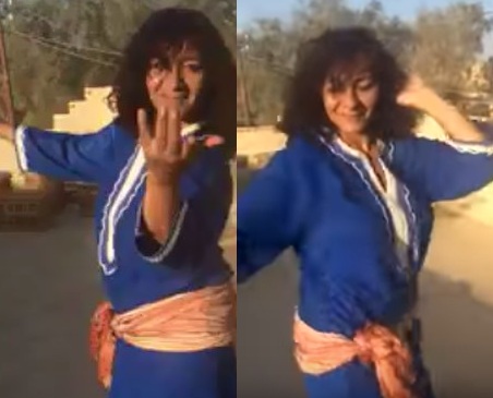 «شاهد» فضيحة كبيرة .. دكتورة بجامعة السويس نشرت صورها بالمايوه ورقصت بإثارة على سطح منزلها!