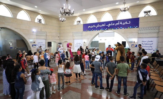 تكية أم علي تقيم احتفالا بعيد الأضحى لأطفال الأسر المنتفعة تكية أم علي تقيم احتفالا بعيد الأضحى لأطفال الأسر المنتفعة