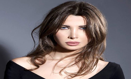 صورة : نانسي عجرم وابنتها الرضيعة بالمسبح صورة : نانسي عجرم وابنتها الرضيعة بالمسبح