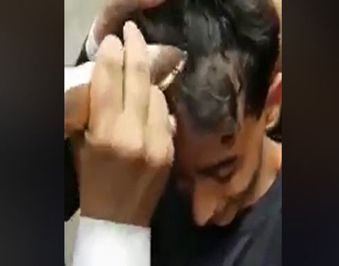 بالفيديو : الحوثي يطبق عقوبة "داعشية" على أطفال وشباب بصنعاء بالفيديو : الحوثي يطبق عقوبة "داعشية" على أطفال وشباب بصنعاء