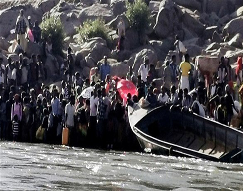 إثيوبيون يفرون من الحرب عبر نهر إلى السودان .. شاهد إثيوبيون يفرون من الحرب عبر نهر إلى السودان .. شاهد