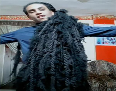 صاحب أطول شعر في مصر : "شعري بالنسبة لى أهم من العالم " .. فيديو وصور صاحب أطول شعر في مصر : "شعري بالنسبة لى أهم من العالم " .. فيديو وصور