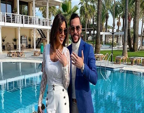 زوج رولا شامية يقبلها برومانسية (صورة) زوج رولا شامية يقبلها برومانسية (صورة)