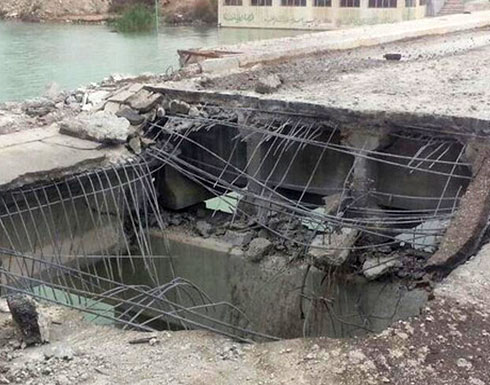 خروج جسر عراقي استراتيجي عن الخدمة بالموصل جراء قصف للتحالف الدولي خروج جسر عراقي استراتيجي عن الخدمة بالموصل جراء قصف للتحالف الدولي