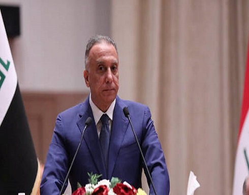 رئيس الوزراء العراقي يرتدي زي الحشد الشعبي (صور) رئيس الوزراء العراقي يرتدي زي الحشد الشعبي (صور)