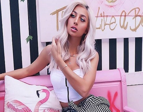 شاهد: مودل روز تثير الجدل بممارسة تمارين فوق ظهر صديقها