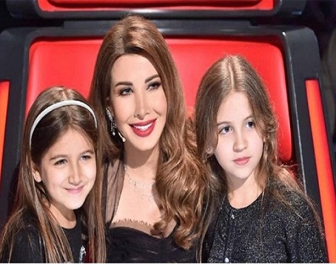 سوري يهدد نانسي عجرم وأسرتها بالقتل (فيديو) سوري يهدد نانسي عجرم وأسرتها بالقتل (فيديو)