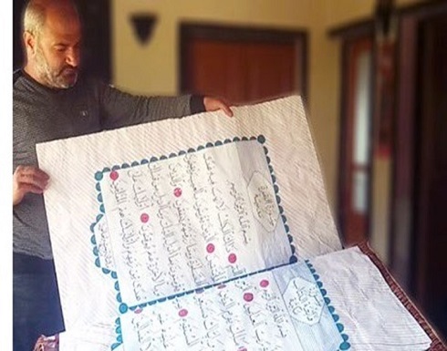 سوري يخط بيده نسخة من القرآن استغرقت ثلاث سنوات (صور) سوري يخط بيده نسخة من القرآن استغرقت ثلاث سنوات (صور)