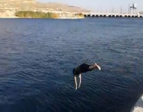 بالفيديو: جنود البغدادي يسبحون في سد الموصل