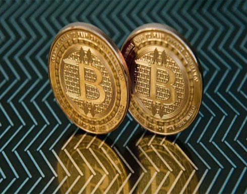 بيتكوين تقترب من عتبة 12 ألف دولار